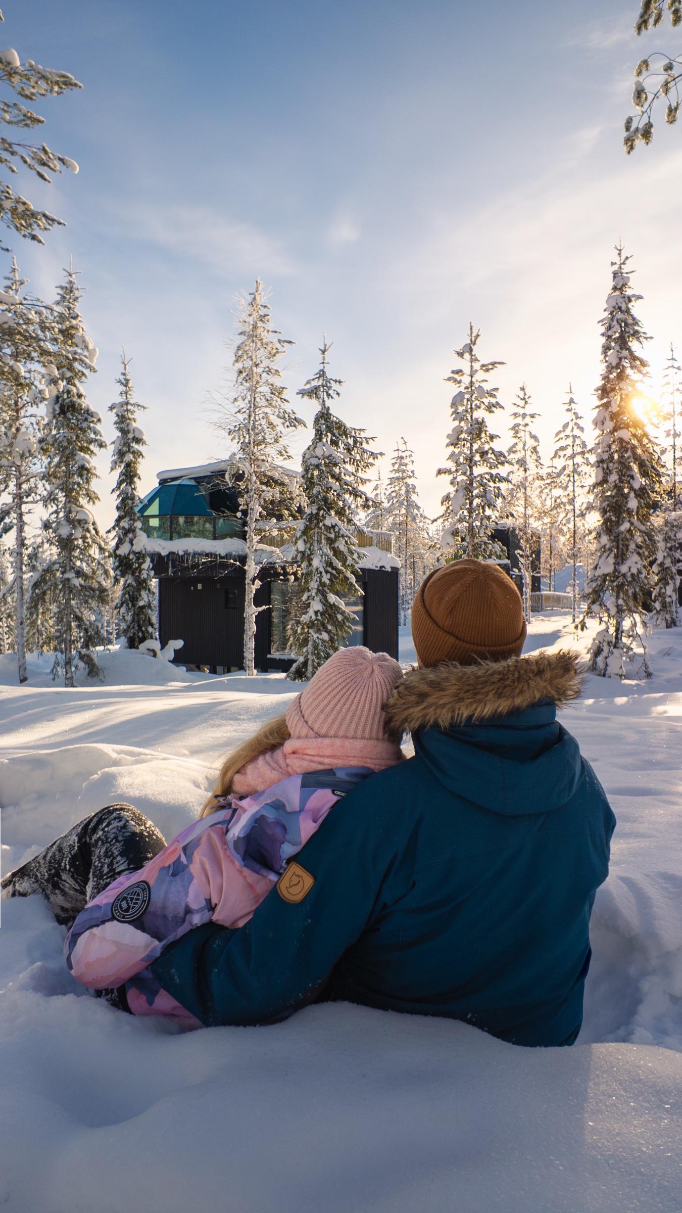 A glass igloo bed at sunrise